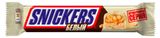 Изображение товара Батончик шоколадный Snickers с карамелью арахисом и нугой в белом шоколаде, 81 г