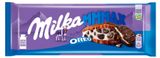 Изображение товара Шоколад молочный Milka MMMAX с ванильной начинкой и кусочками печенья Орео, 253 г