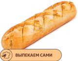 Изображение товара Багет АШАН половинка с чесноком, 157 г