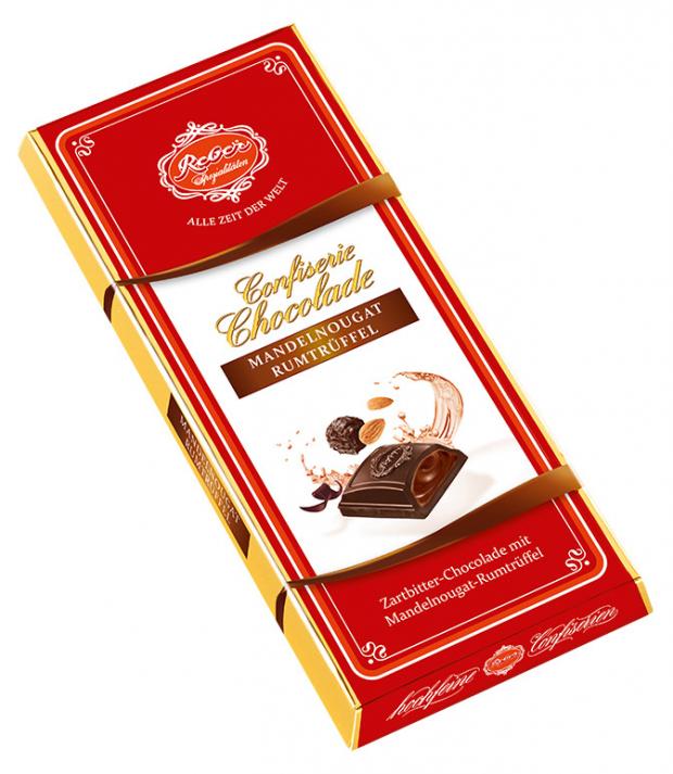 

Шоколад горький Reber с трюфельной начинкой миндаль и ром, 100 г