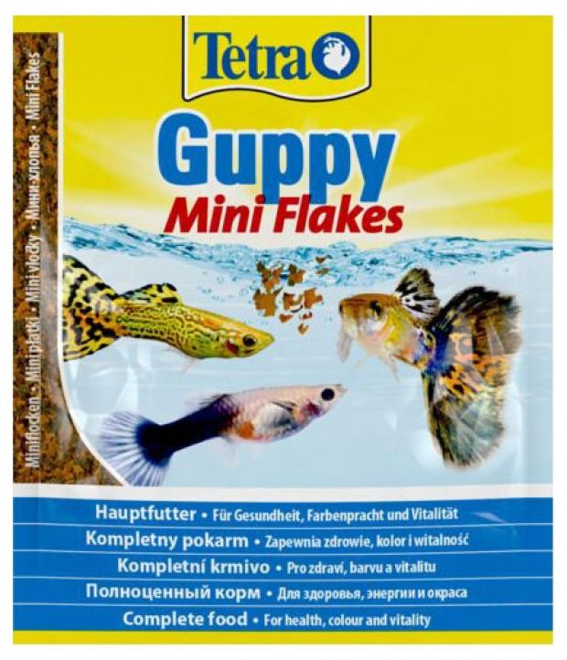 Корм для рыб Tetra Guppy Flakes мини-хлопья для группи, 12 г корм для рыб tetra guppy для гуппи пецилий меченосцев и живород пицилиевых в хлоп 12г пакетик